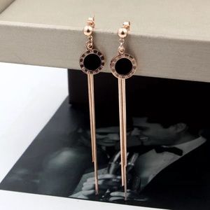 14k Rose Gold Roman Numeral Style Dangle E…